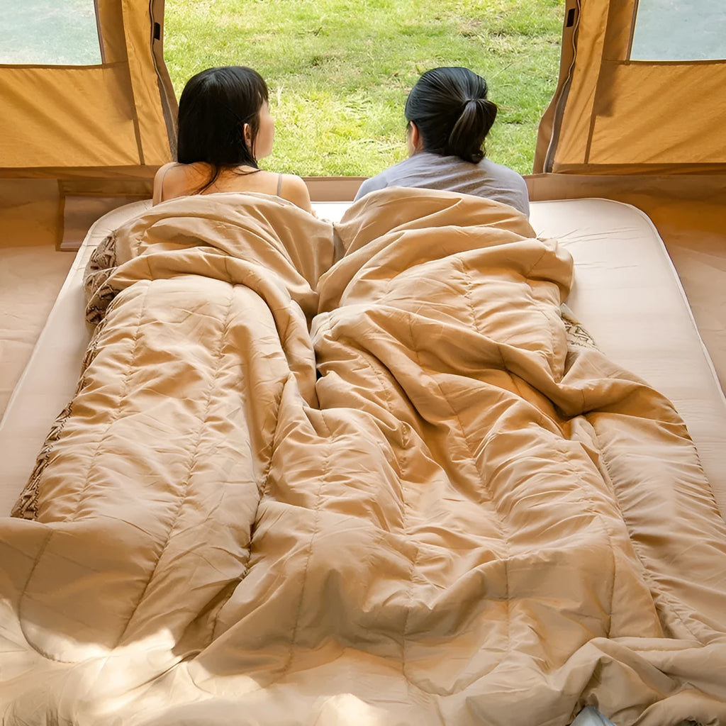 Four seasons portable camping sleeping bag for adults in Jiangnan Spring colour with storage bag.