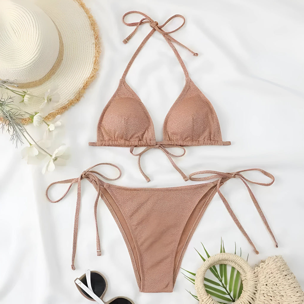 Women's split bandage bikini swimsuit in polyester fabric showing colour options and styling