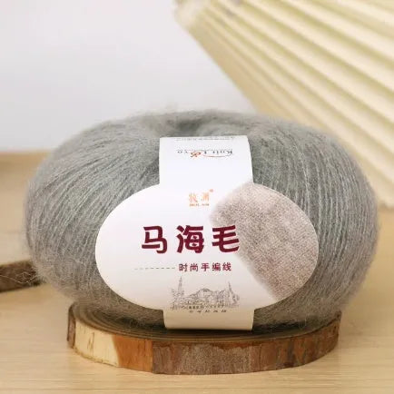 Mohair wool ball for DIY scarf knitting in assorted colours on white background