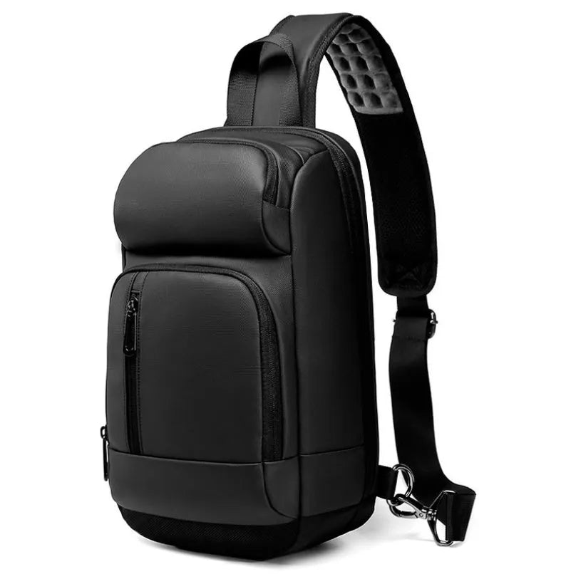 Black PVC outdoor shoulder bag showing computer pocket, air cushion strap, and organisational compartments