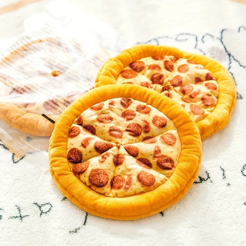 Yellow pizza slice shaped soft fabric dog chew toy with internal squeaker.