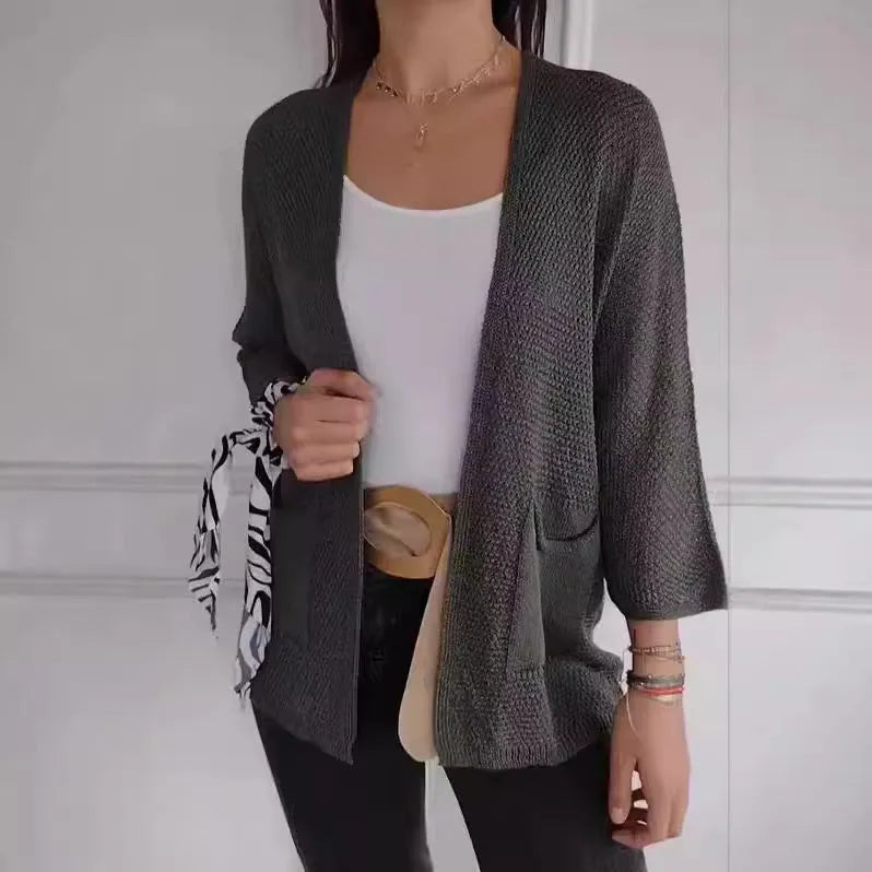 Women's thin waffle weave cardigan coat in army green with nine-quarter sleeves and pockets.