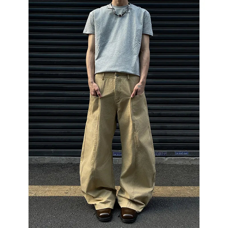 Men's khaki coloured straight-leg cotton casual trousers laid flat, showcasing the retro style and solid colour.