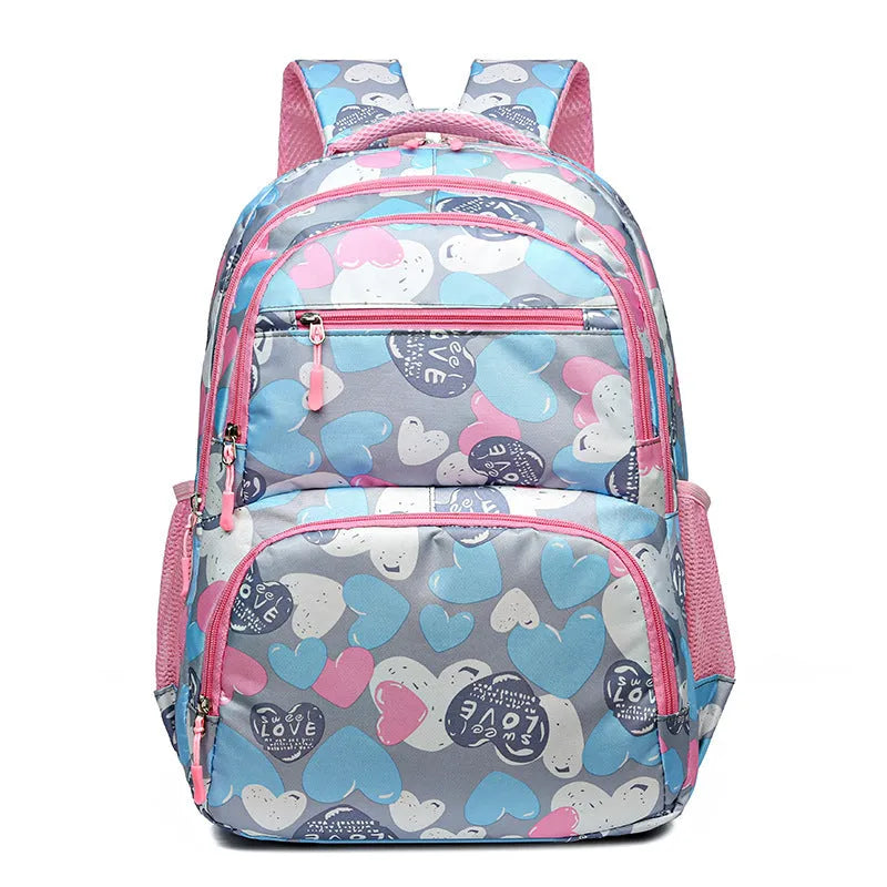 Blue student backpack with air cushion shoulder straps, large main compartment and Oxford cloth material.