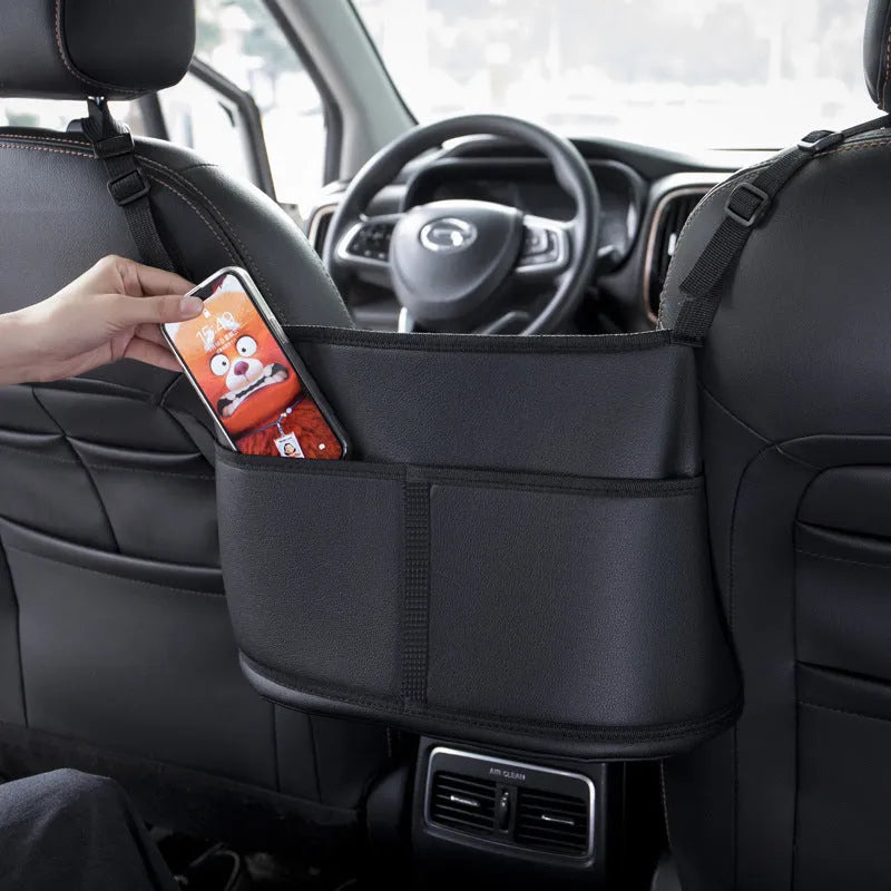 Black leather car seat storage bag with sports carbon fibre pattern, dimensions 38x24x15 cm