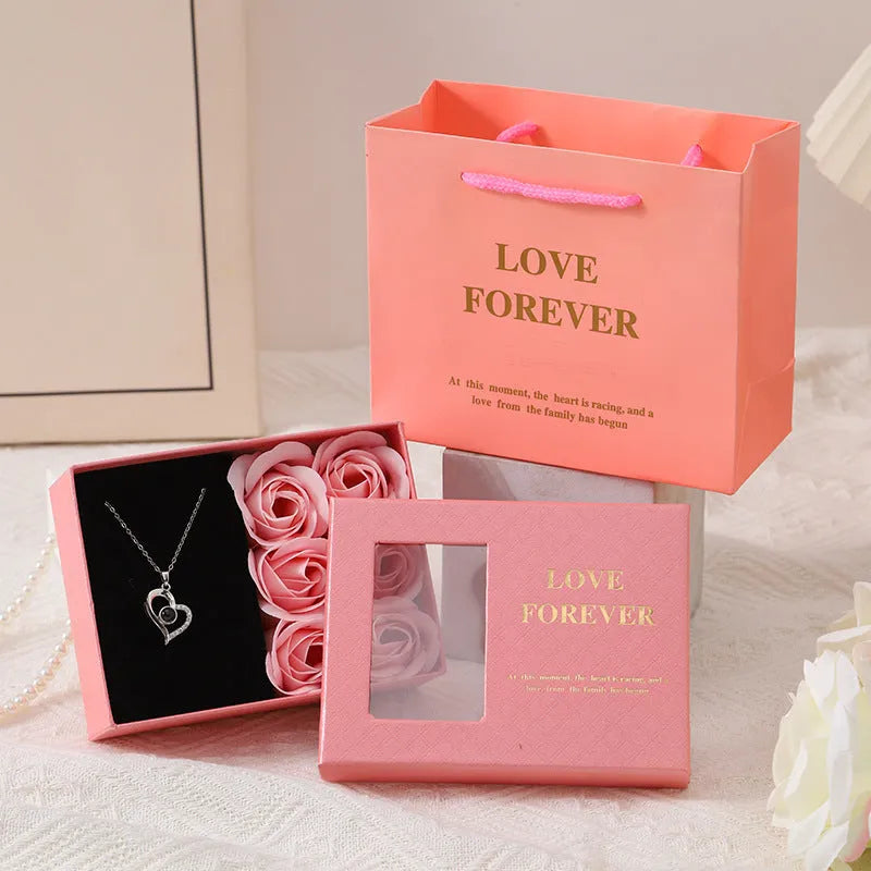 Red Korean-style soap flower gift set with six flowers in a box, handbag, and measuring 12.5 by 8.5 by 4.5 cm.