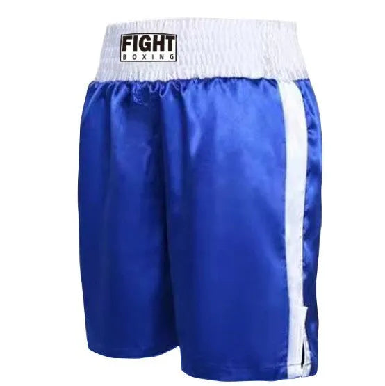 Man wearing black and white striped elastic waist kickboxing shorts in a training stance.