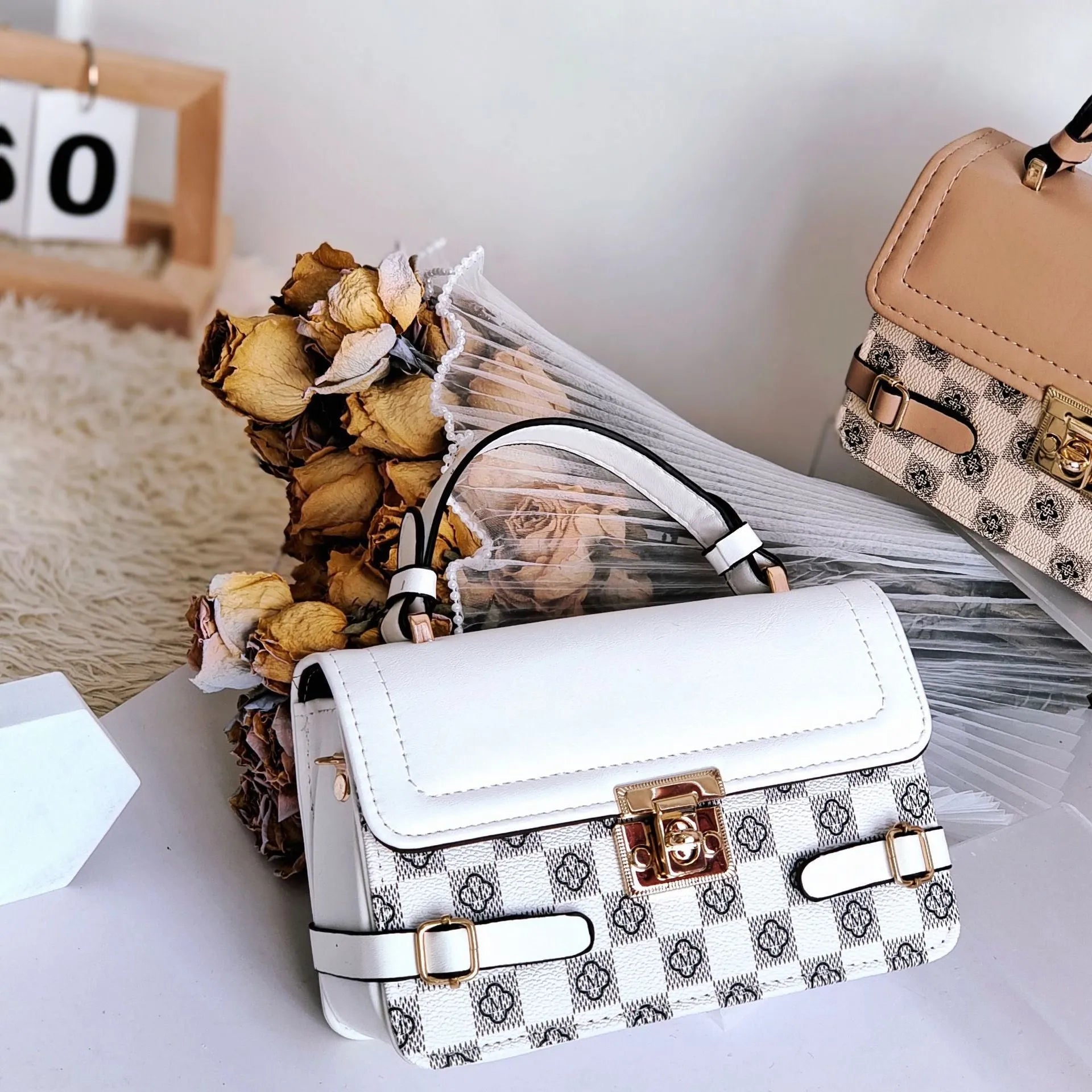 Brown ethnic pattern square crossbody bag with file compartment and structured PU build