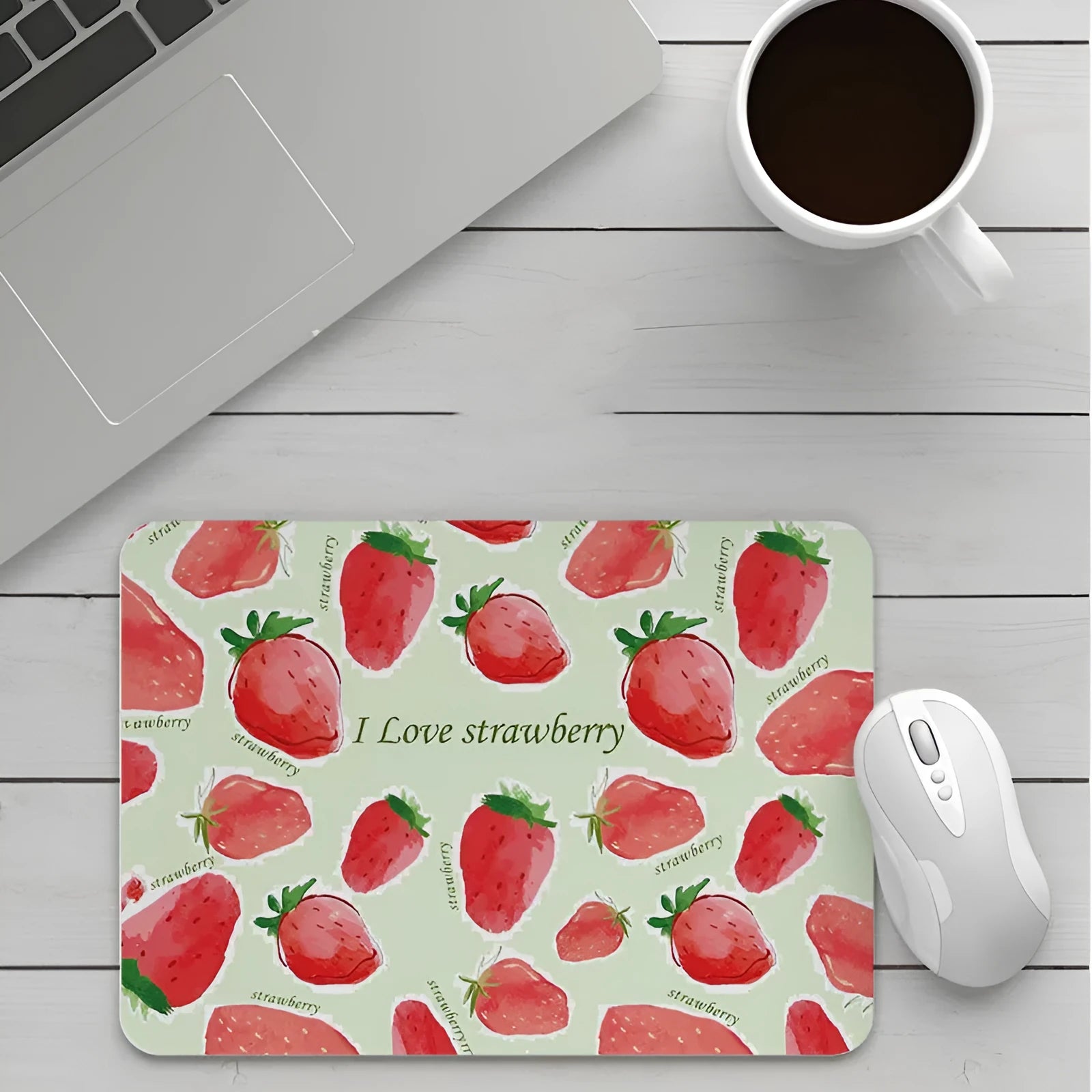 Custom cartoon design on a small black thickened mouse pad with stitching, shown on a desk.