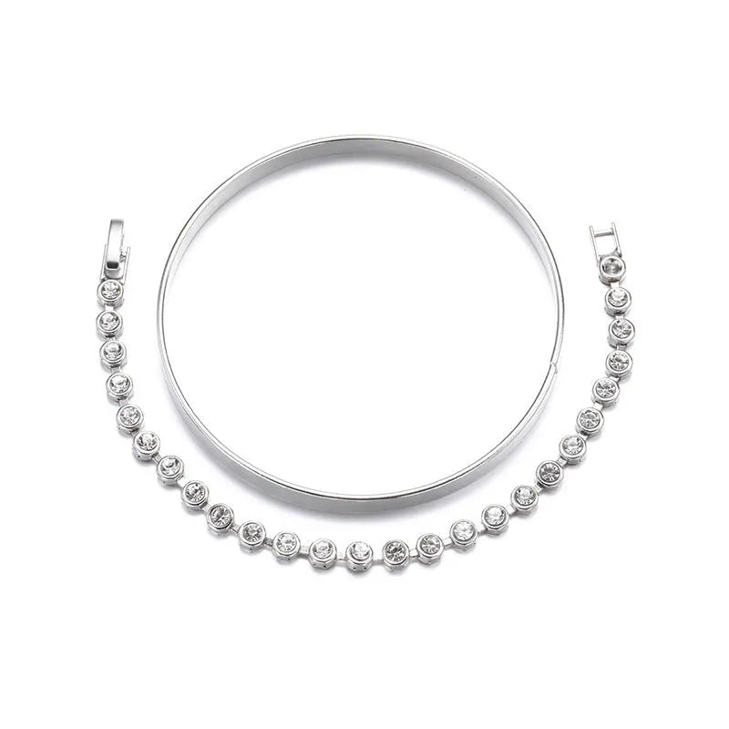 Gold and silver zinc alloy vintage bracelet set with drop-shaped geometric links on a white background