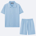 Women's khaki short sleeve sweater and shorts two-piece set laid flat.