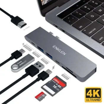 Silver aluminium USB-C multi-port adapter hub with SD card slot, HDMI, USB ports, and Power Delivery.