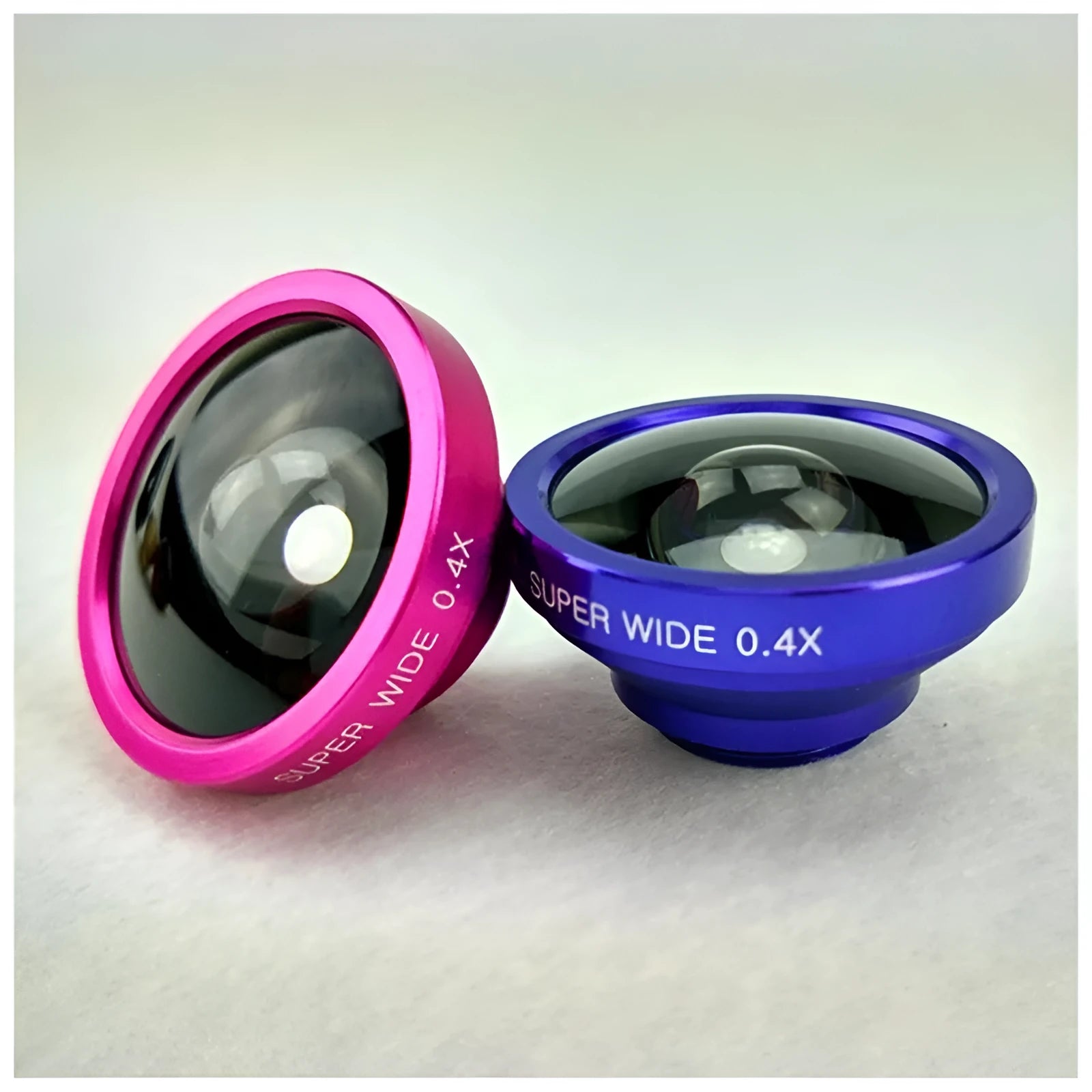 Smartphone clip-on lens kit showing fisheye lens and 2-in-1 wide angle macro lens with universal clip