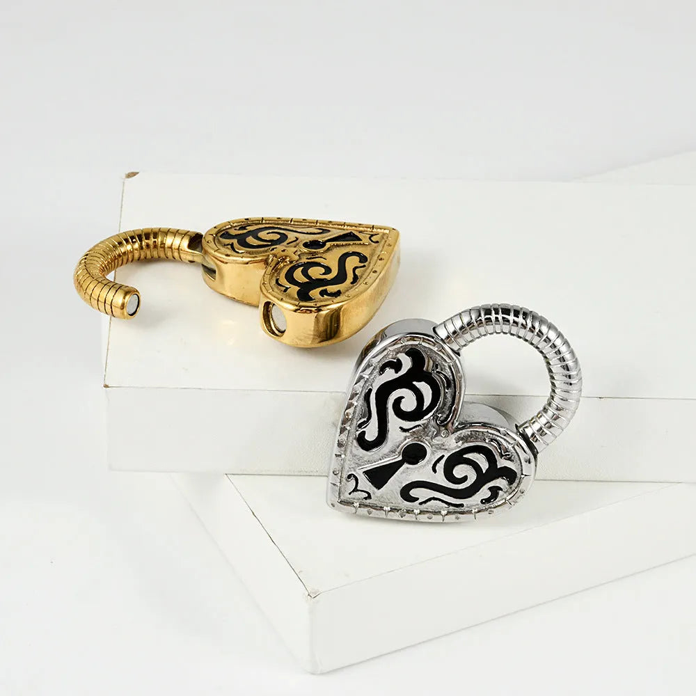 Heart-shaped stainless steel earrings with electroplated gold and steel colour finishes
