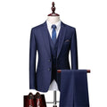 Men's navy blue three-piece slim fit plaid suit with jacket, vest, and trousers on hanger