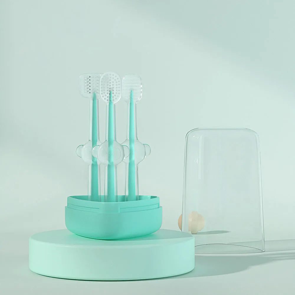 Pet toothbrush with flexible silicone brush head in blue, green, and purple colours for cat and dog dental care