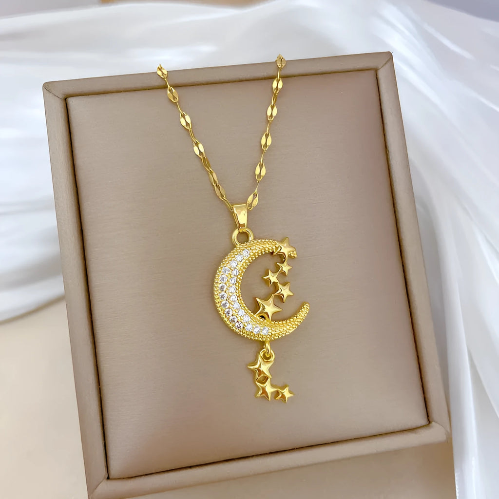 Silver tone necklace with moon-shaped copper pendant on stainless steel chain