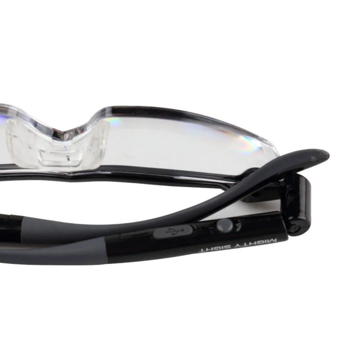 Transparent black USB LED light reading glasses on a table, showing the built-in light and frame.