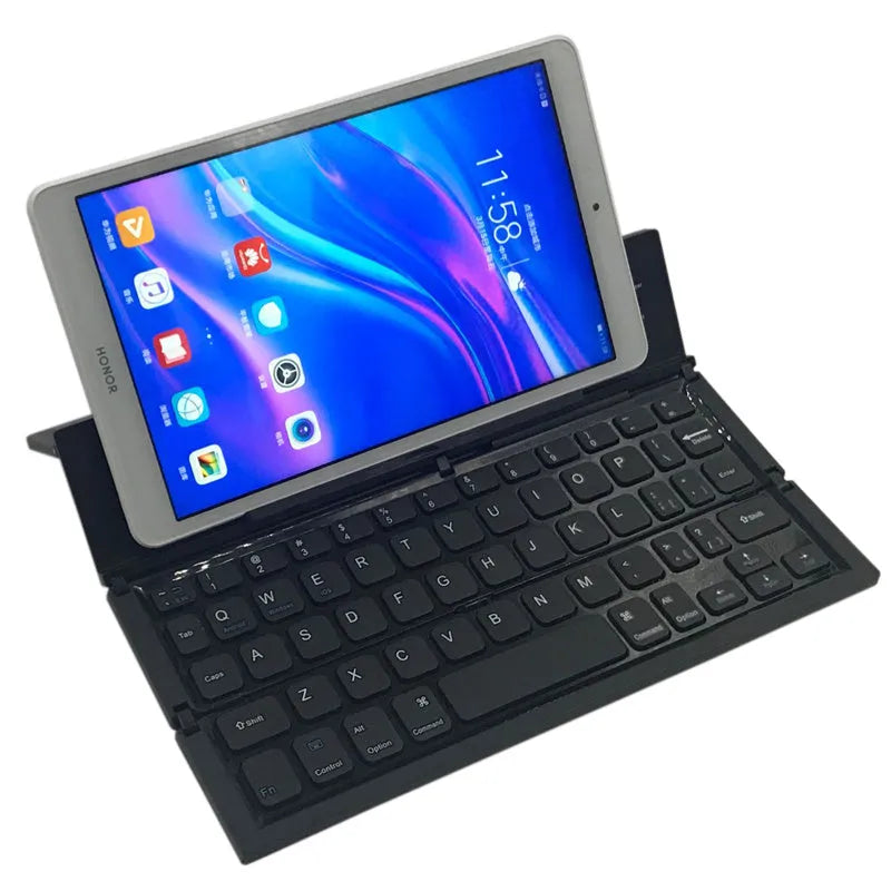 Black foldable Bluetooth keyboard shown alongside tablet demonstrating 8-inch compact size and portable design