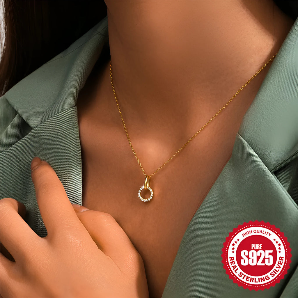 Gold colour geometric sterling silver necklace with interlocking design and zircon details on adjustable chain