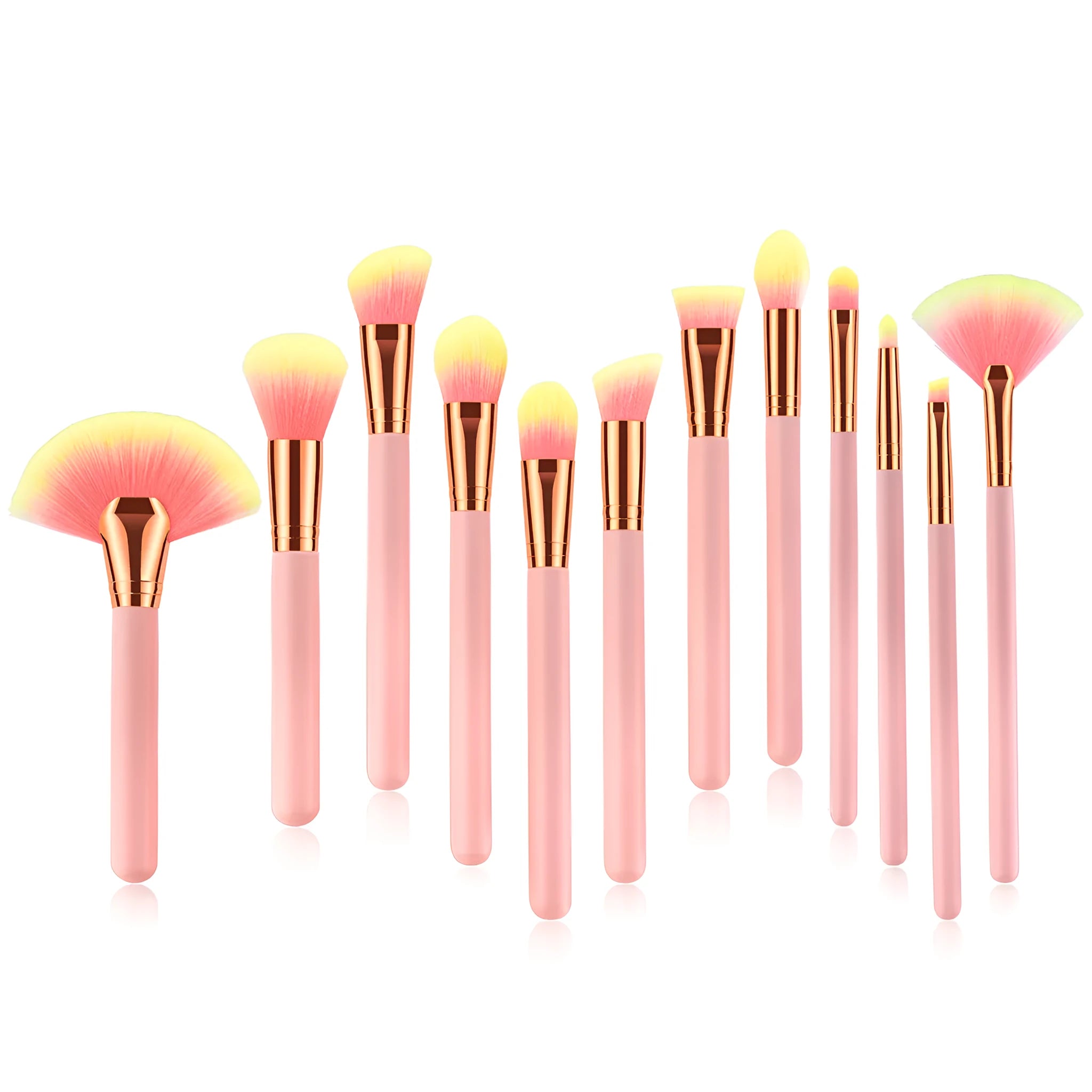 Pink 10-piece makeup brush set with nylon wool bristles and wooden handles laid out on a flat surface