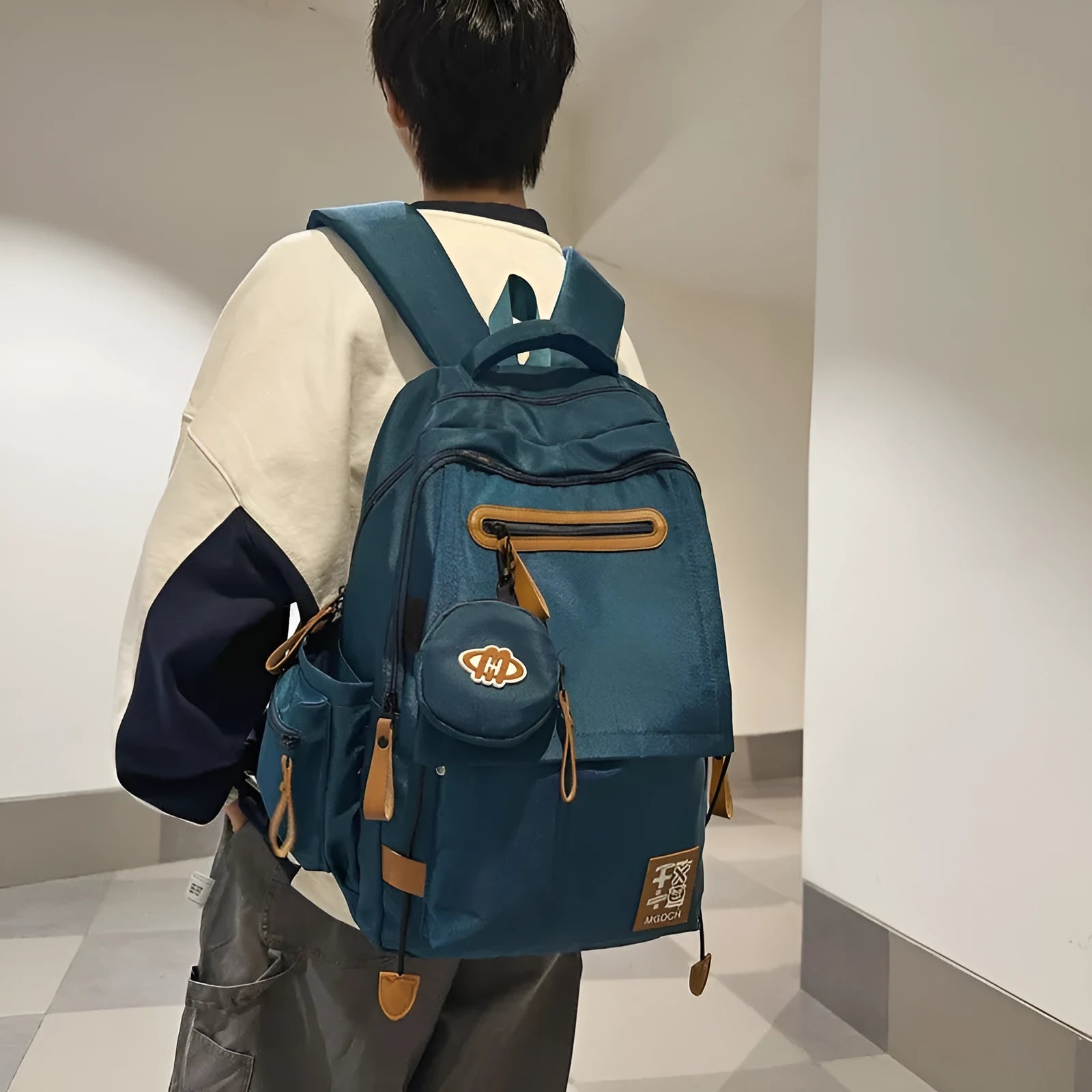 Nylon school backpack with curved shoulder straps in multiple colour options including khaki and red