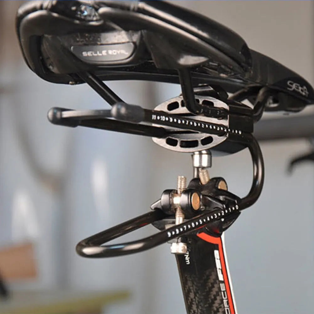 Black bicycle seatpost suspension device on bike showing spring steel alloy construction