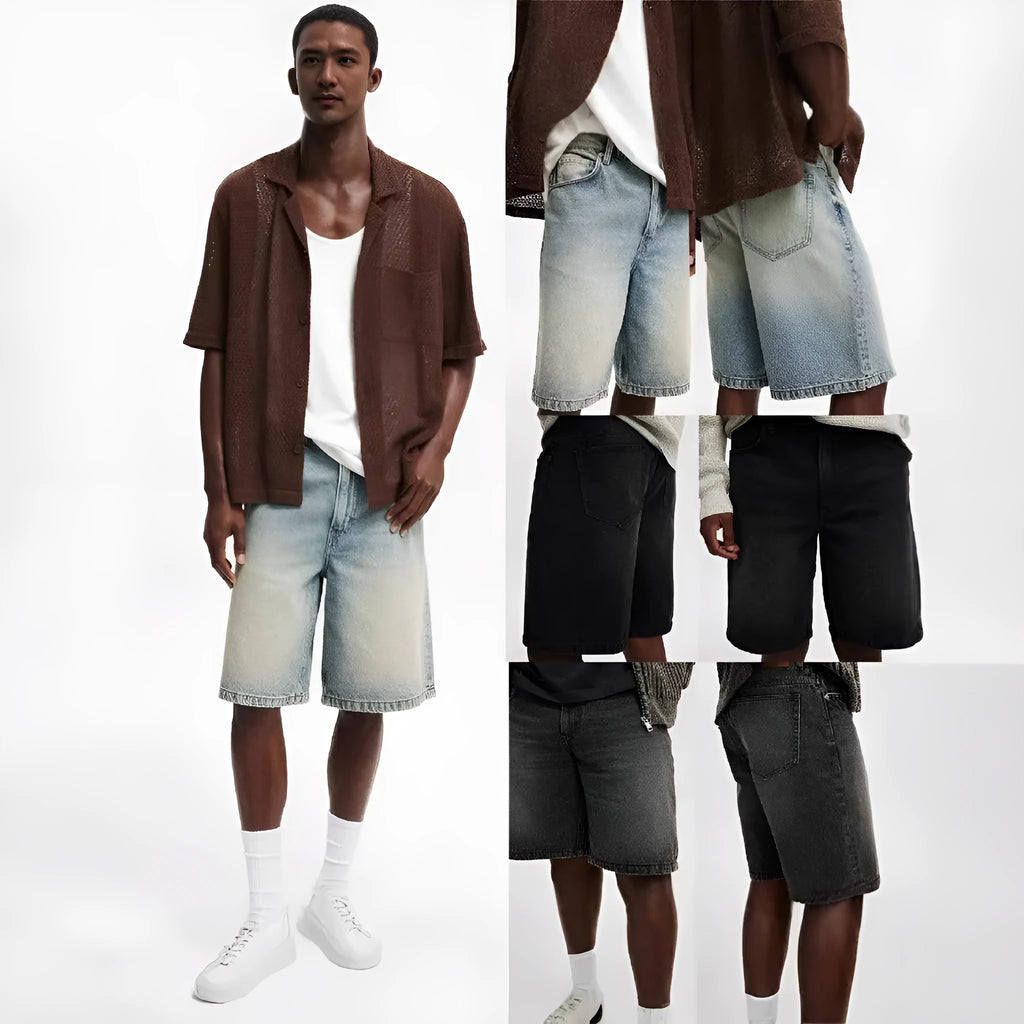 Men's loose straight leg jeans in light blue denim on a plain background