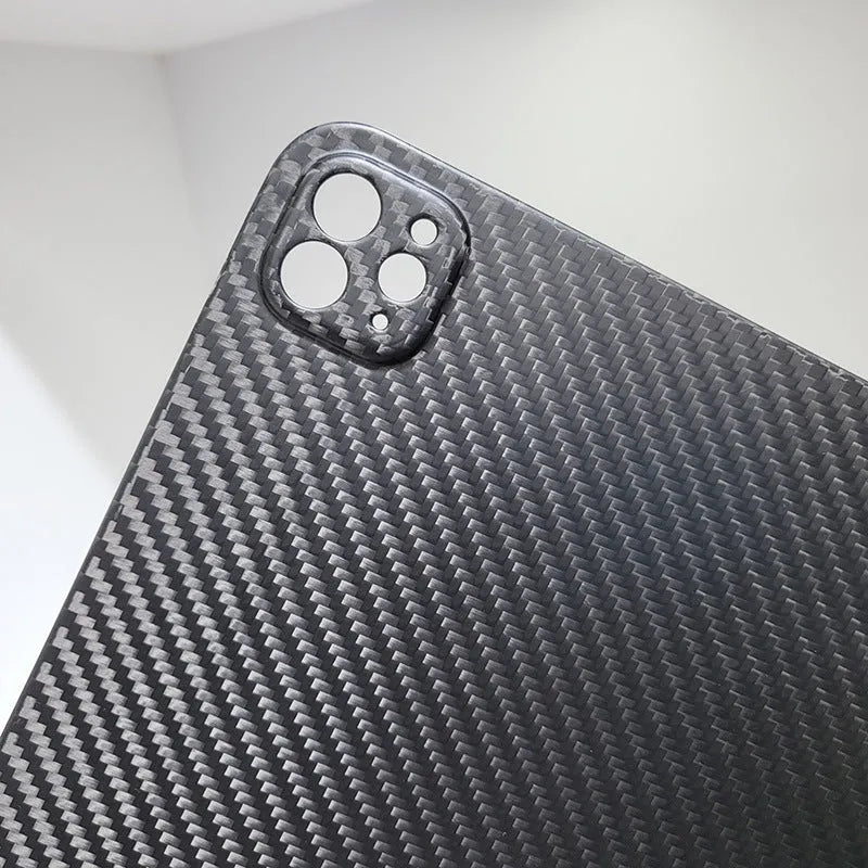 Carbon fibre hard protective cover for Apple iPad Pro 11 showing textured plaid pattern.