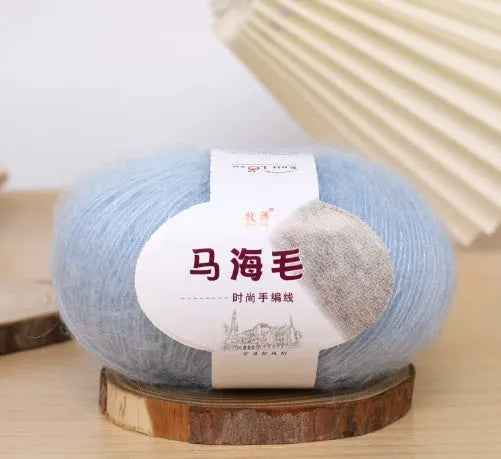 Mohair wool ball for DIY scarf knitting in assorted colours on white background