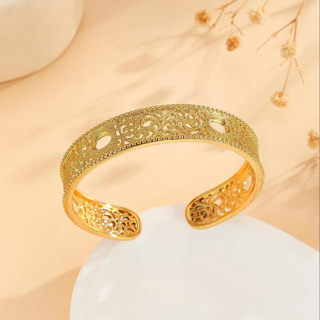 Gold bracelet with hollowed out lace flower design, gold finish, gold plated copper