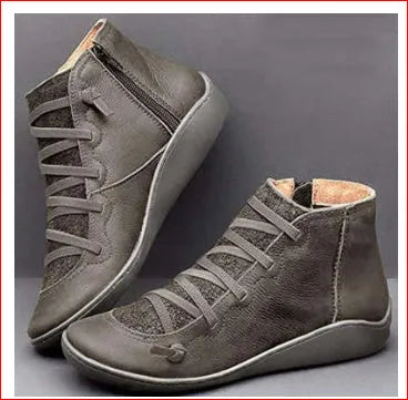 Women's casual round-toe ankle boots with a wedge heel in artificial PU, shown in multiple colour options.