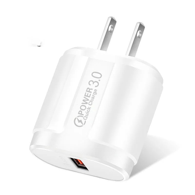 White and black international smartphone charger with UK, US and EU plug options