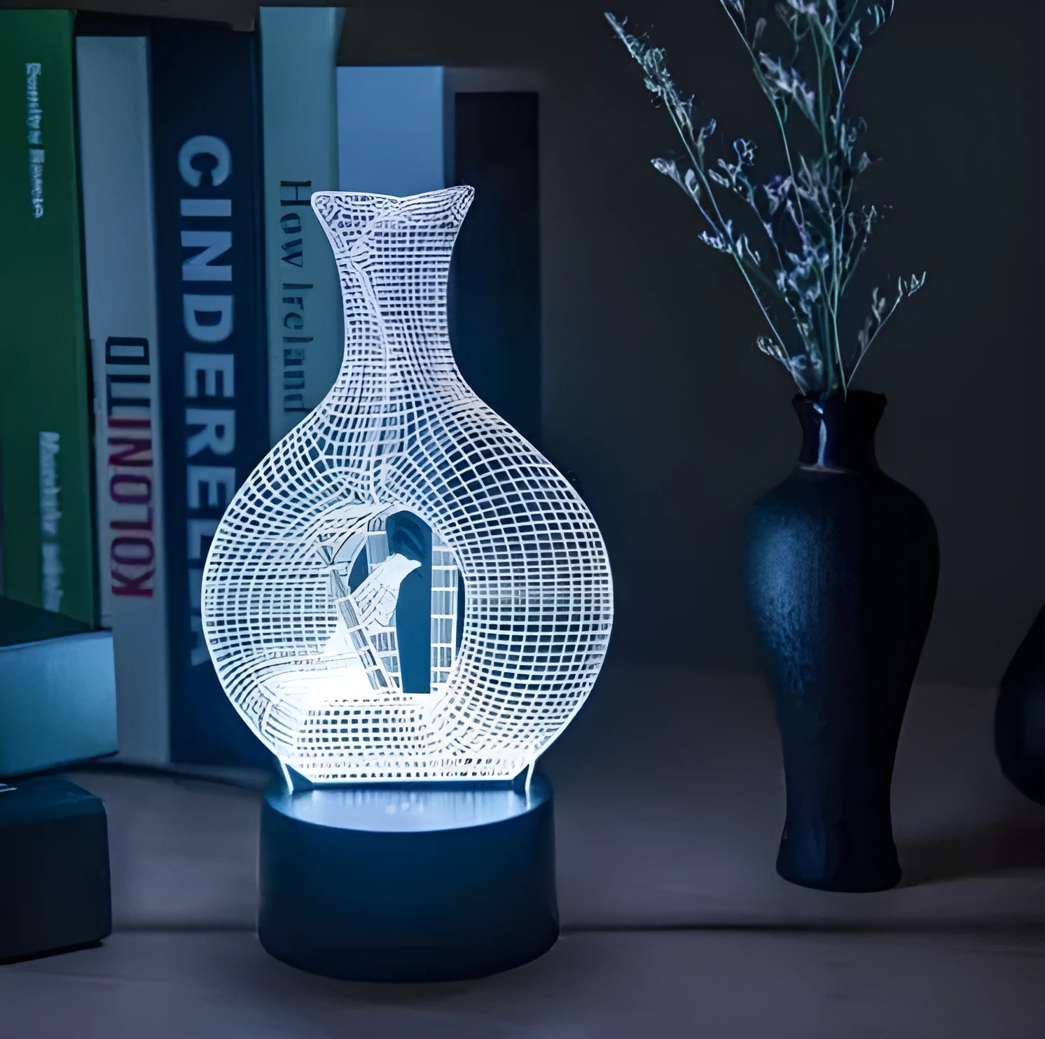 3D acrylic LED night light with ABS base showing seven colour changing options