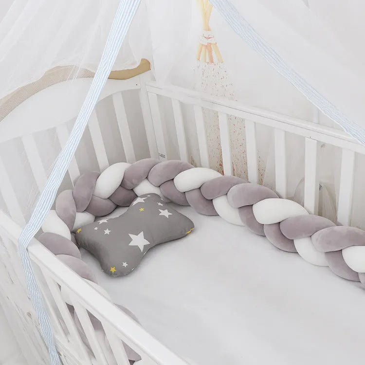 Braided knot crib bumper in spandex velvet, showing flexible length options for cot protection.