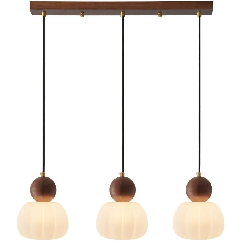 Nordic pumpkin-shaped alloy chandelier for ceiling mounting in a bedroom or dining room.