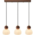 Nordic pumpkin-shaped alloy chandelier for ceiling mounting in a bedroom or dining room.