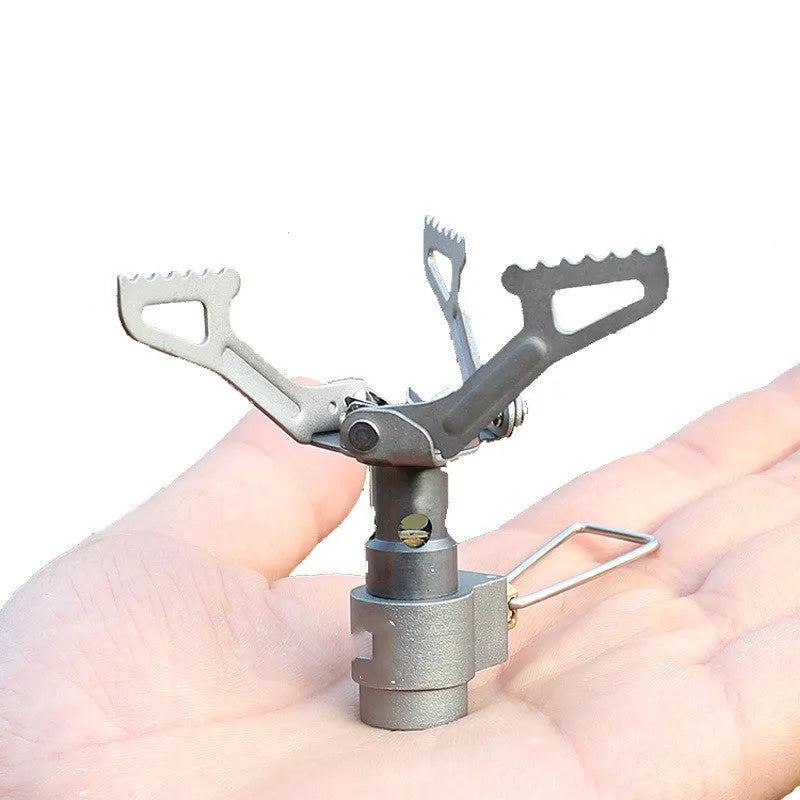 Portable propane gas camping stove with compact one-piece design for outdoor use