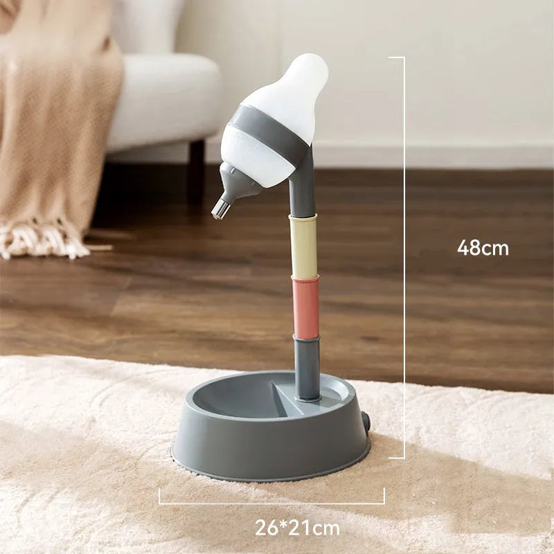 Green adjustable-height standing water dispenser for pets with a detachable pole and separate bowl.