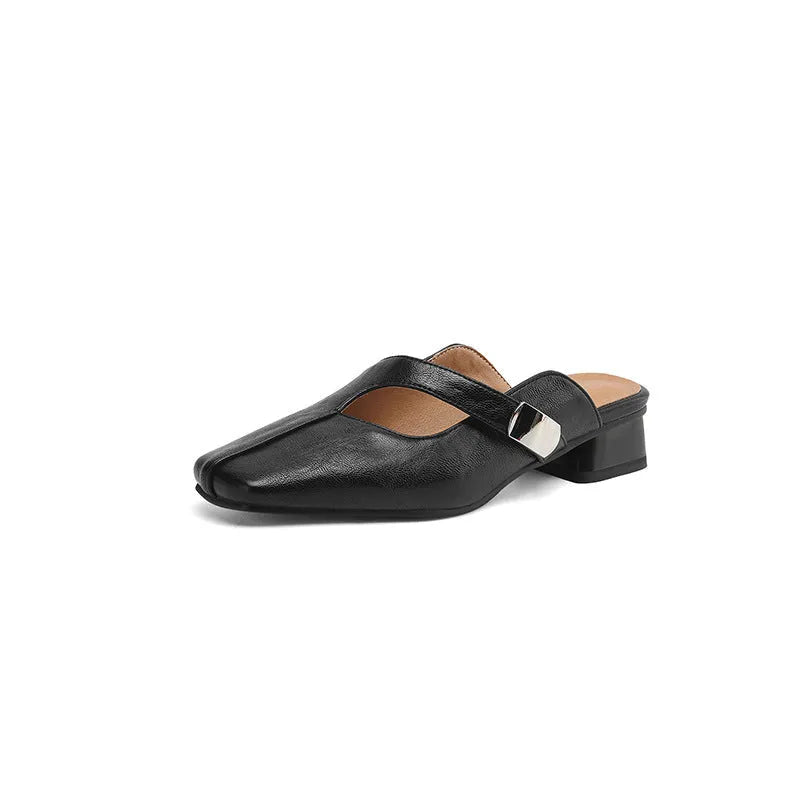 Pair of square-toe casual slippers with a low heel on a rubber sole, shown in a solid colour.