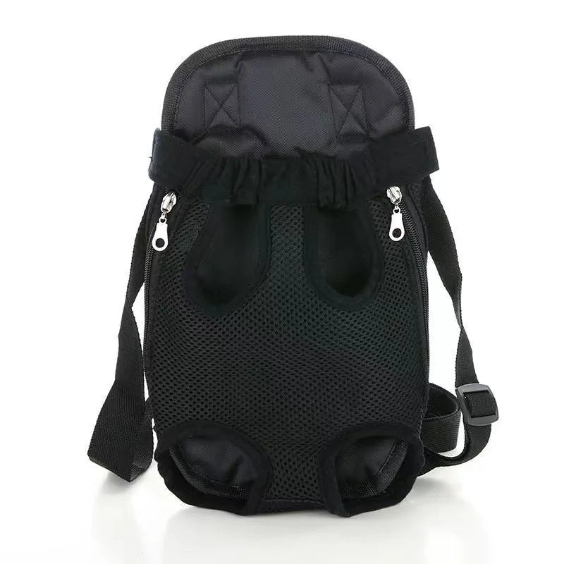 A person wearing a blue nylon dog carrier backpack on their front, containing a small dog. The bag shows mesh panels and an open-top design.