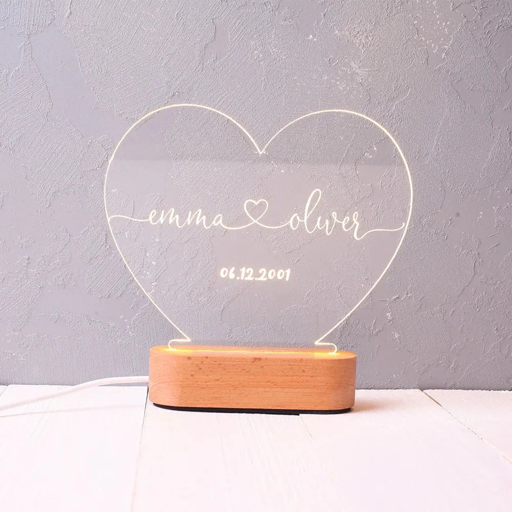 Transparent acrylic custom night light measuring 20cm by 11.5cm with personalised text