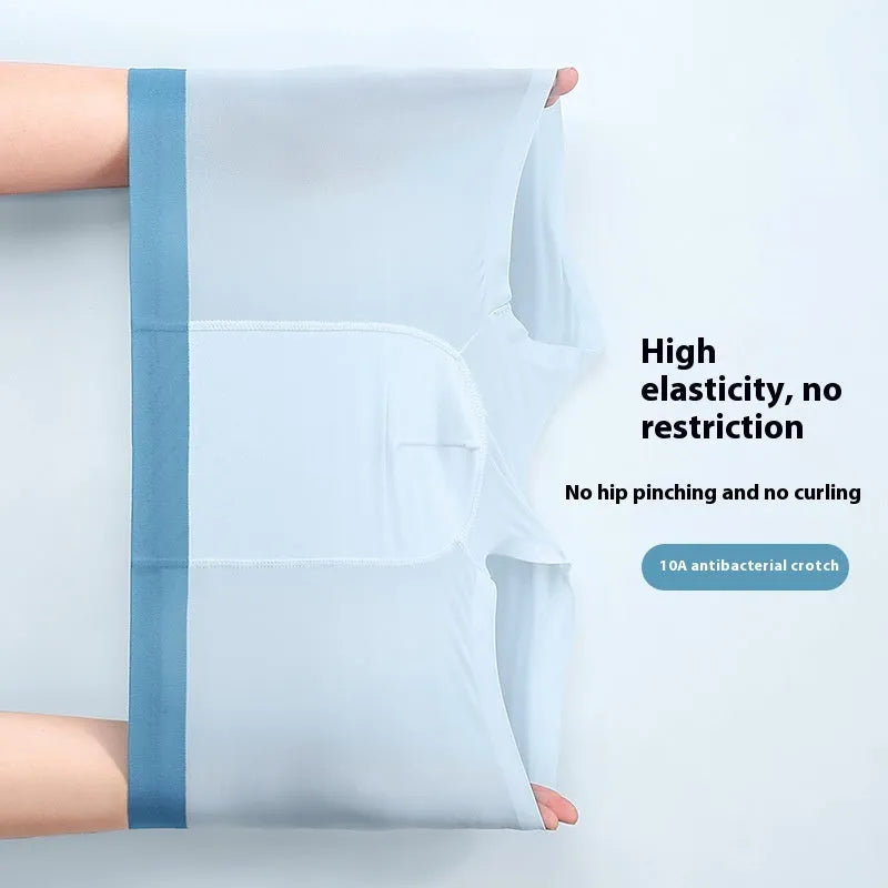 Men's ice silk graphene antibacterial shorts in light blue shown flat, highlighting seamless knit and mid-waist design.