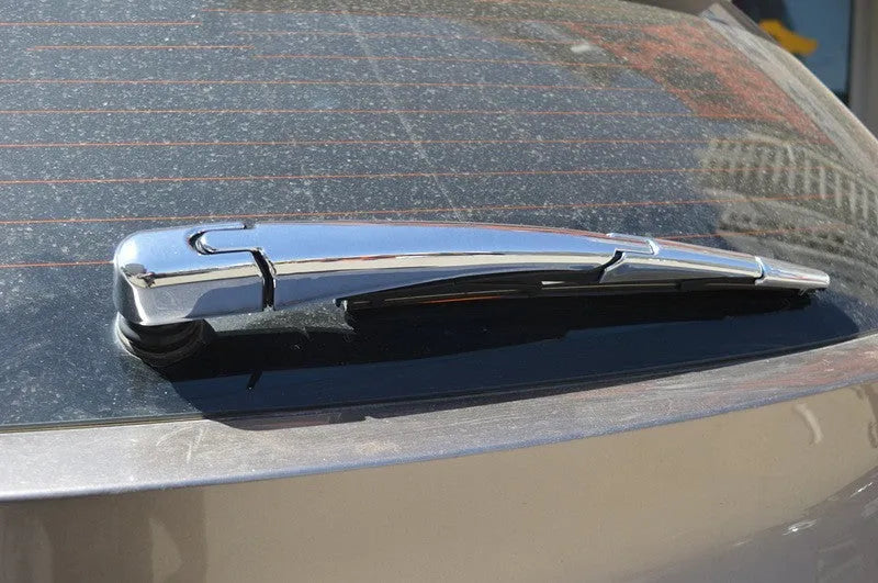 Four silvery ABS plastic rear window wiper cover trims for 2010 Hyundai models.