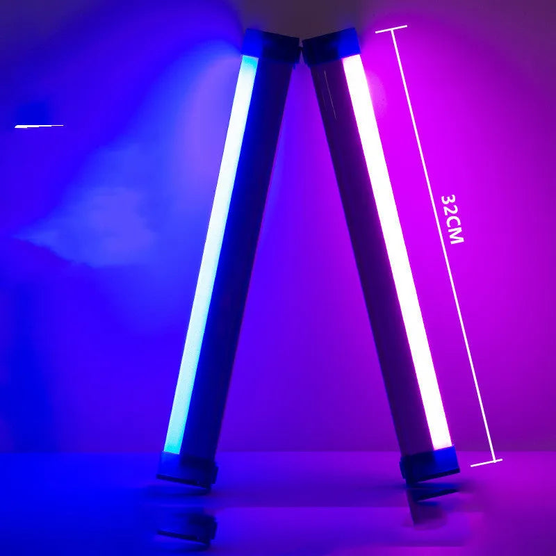 Blue and purple rechargeable LED tube light stick with dimmable RGB settings for photography and room ambience.