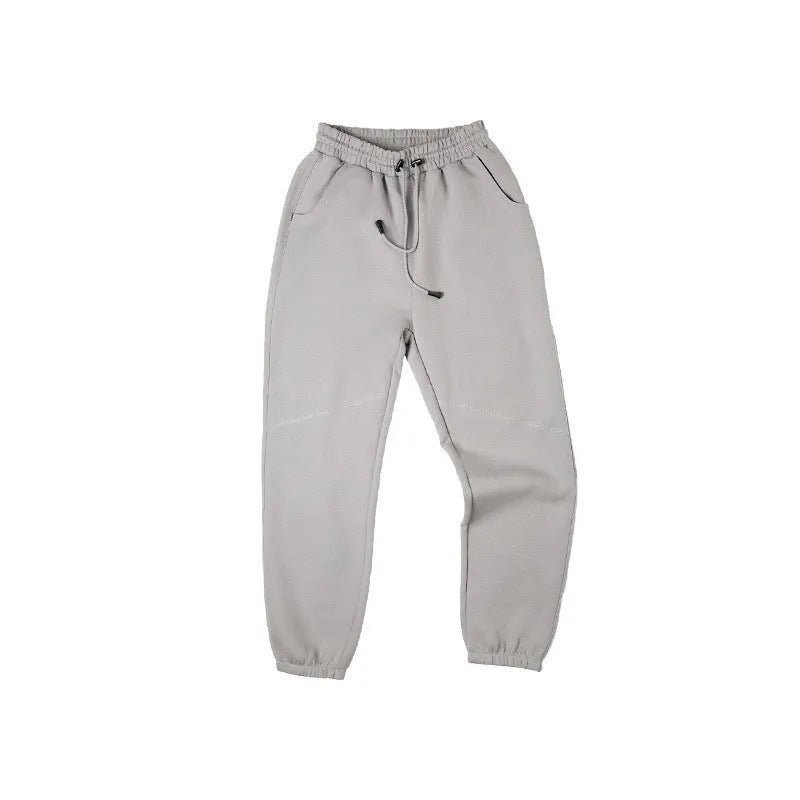 Men's cotton air layer straight-leg sweatpants in dark gray on a model