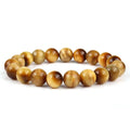 Unisex tigereye crystal bead bracelet with round geometric beads, shown in a dark blue variant.