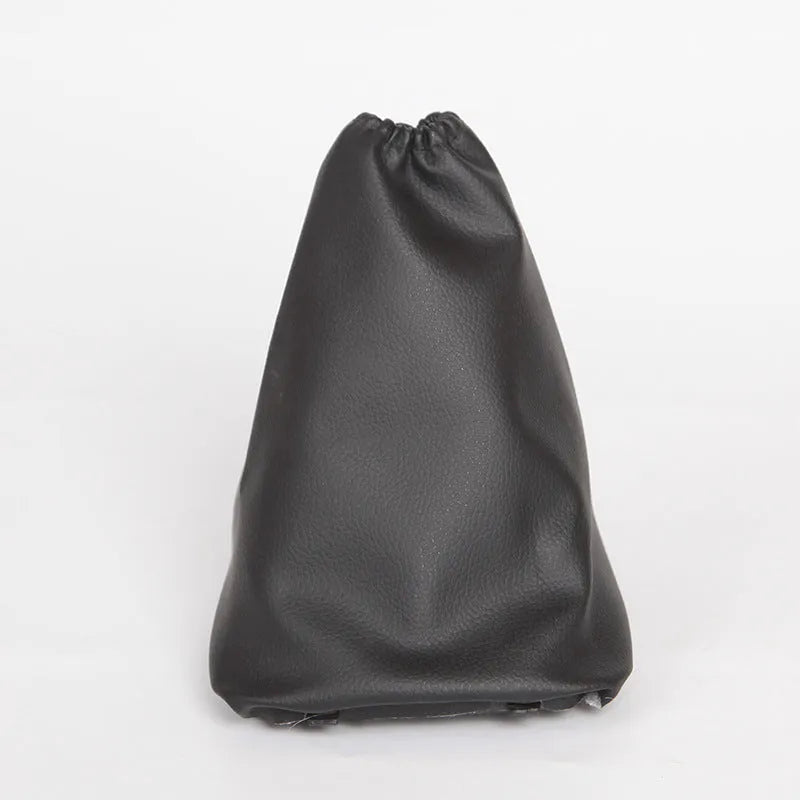 Black leather car shift lever dust cover shown with dimensions 15.2cm by 12.9cm