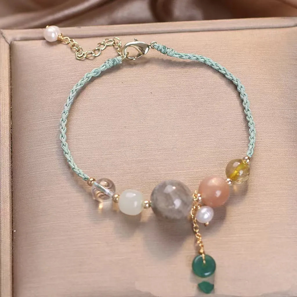 Hand-woven crystal bracelet with sequin details and adjustable buckle in three colour options