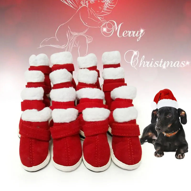 Red pet warm plush Christmas shoes with non-slip rubber sole for small dogs on a festive background